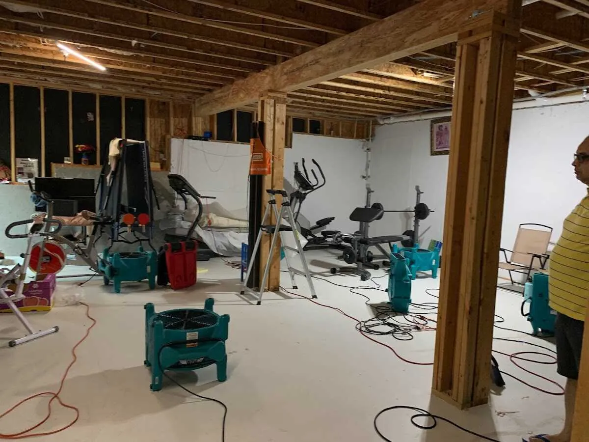 Basement drying equipment setup for Contents Cleaning & Restoration in Spring Lake
