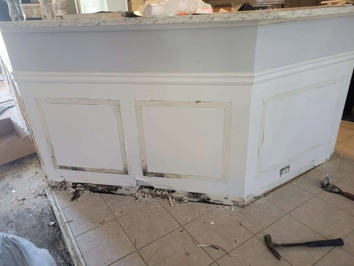 Water damage and mold on kitchen during Storm Damage Restoration in Spring Lake